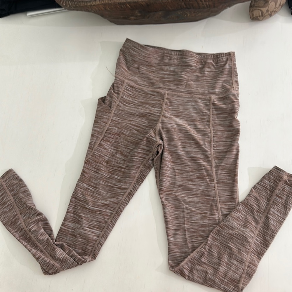 Brownish maroon women’s leggings. Size small. Barely worn.